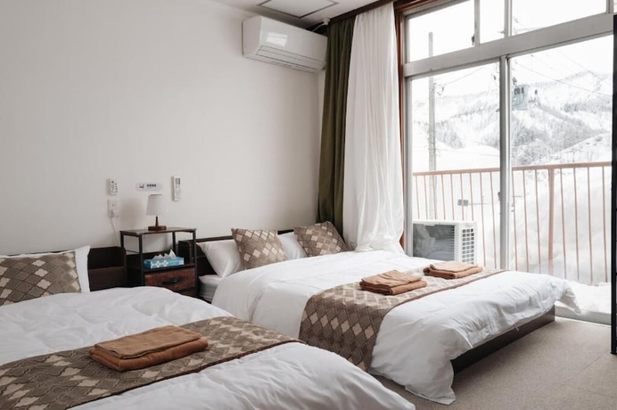 Imagen de la habitación del Hotel YUZAWA Yukinoyado. Foto 2