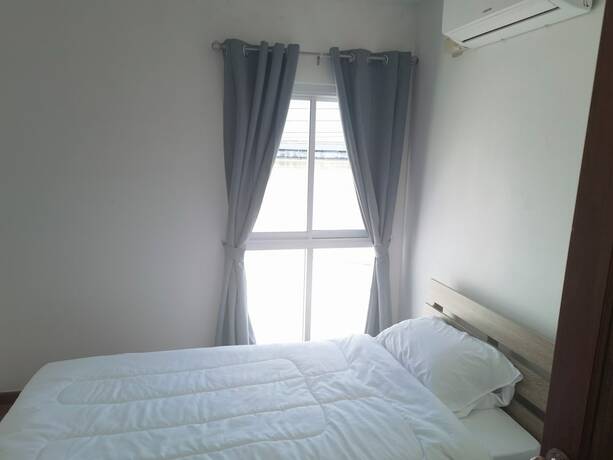 Imagen de la habitación del Hotel YYK Holiday Rooms. Foto 7