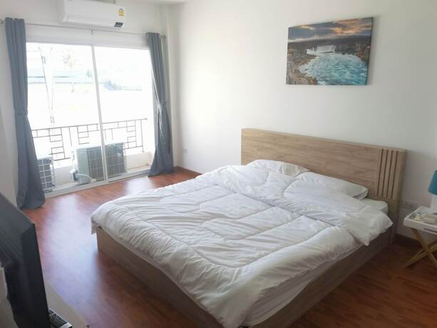 Imagen de la habitación del Hotel YYK Holiday Rooms. Foto 10