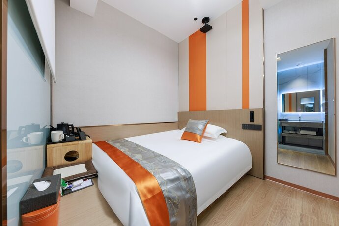 Imagen de la habitación del Hotel Ya Chen. Foto 19