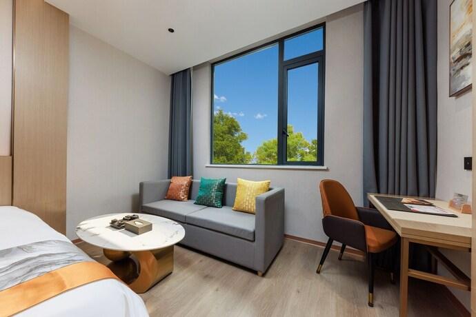 Imagen de la habitación del Hotel Ya Chen. Foto 23