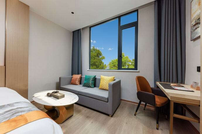 Imagen de la habitación del Hotel Ya Chen. Foto 25