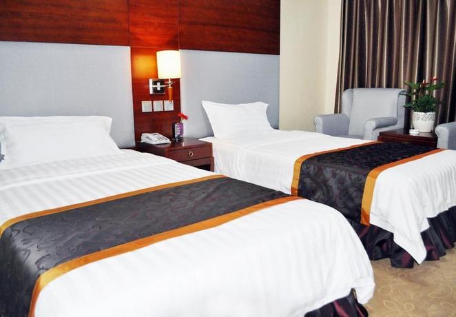 Imagen de la habitación del Hotel Ya Tai, Changchun. Foto 6