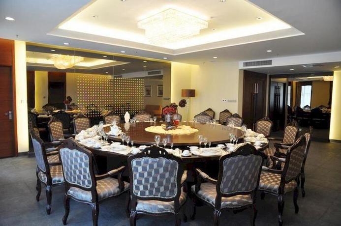Imagen del bar/restaurante del Hotel Ya Tai, Changchun. Foto 4