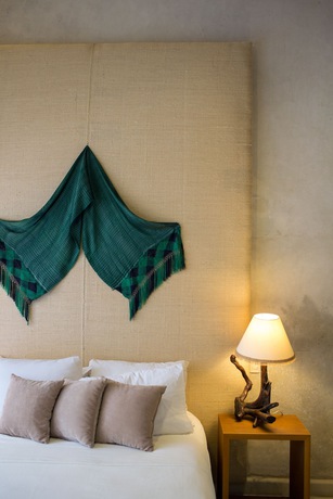 Imagen de la habitación del Hotel Ya\'ax Boutique. Foto 9