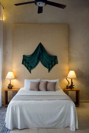 Imagen de la habitación del Hotel Ya\'ax Boutique. Foto 11