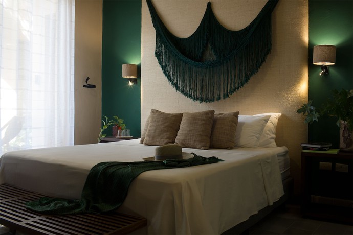 Imagen de la habitación del Hotel Ya\'ax Boutique. Foto 13