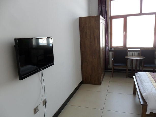 Imagen de la habitación del Hotel Yabuli Courtyard. Foto 8