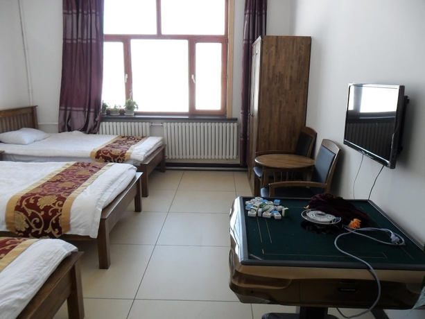 Imagen de la habitación del Hotel Yabuli Courtyard. Foto 10