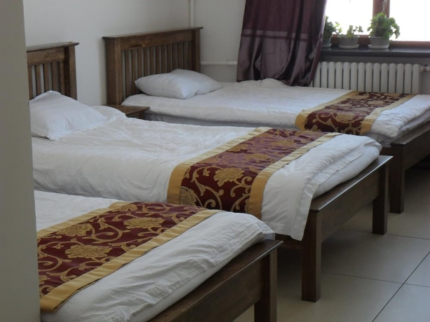 Imagen de la habitación del Hotel Yabuli Courtyard. Foto 11