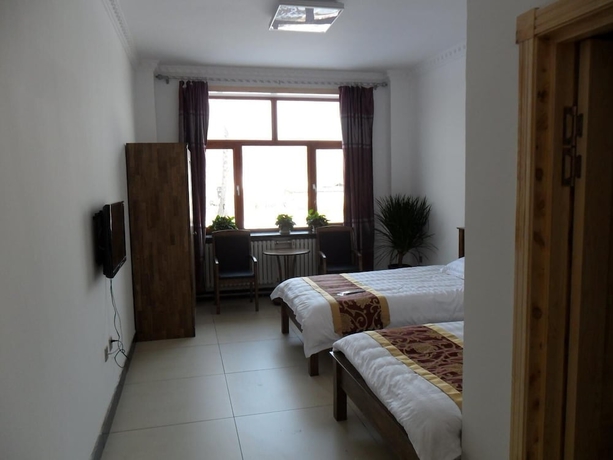 Imagen de la habitación del Hotel Yabuli Courtyard. Foto 13