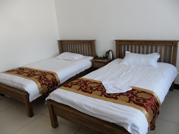 Imagen de la habitación del Hotel Yabuli Courtyard. Foto 15