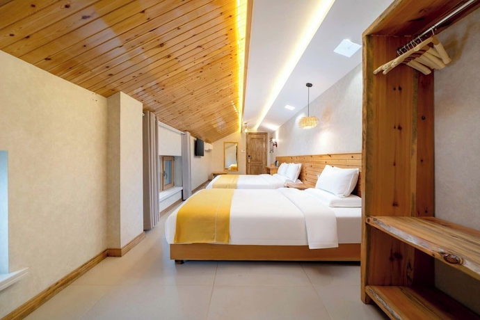 Imagen de la habitación del Hotel Yabuli Liangqi Qingyun Homestay. Foto 5