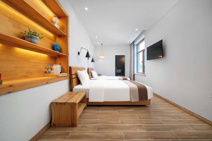 Imagen de la habitación del Hotel Yabuli Liangqi Qingyun Homestay. Foto 13