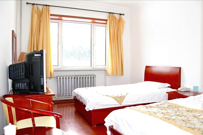 Imagen de la habitación del Hotel Yabuli Olympic Club Hotel. Foto 11