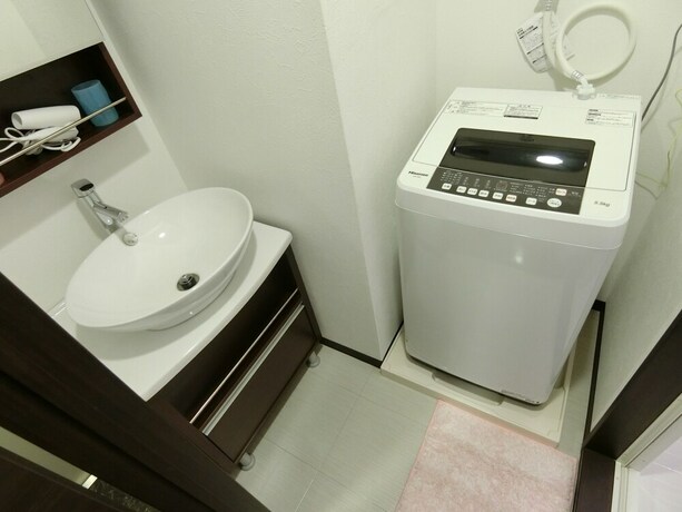 Imagen de la habitación del Hotel Yado At Tshuruhashi Extsu103. Foto 21