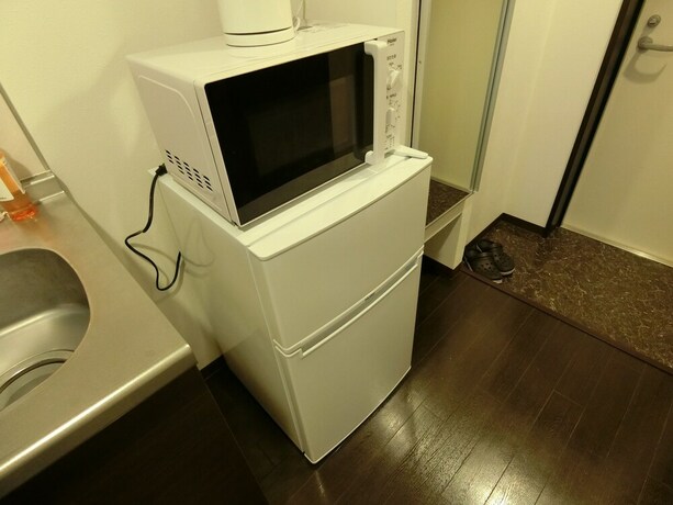Imagen de la habitación del Hotel Yado At Tshuruhashi Extsu103. Foto 29