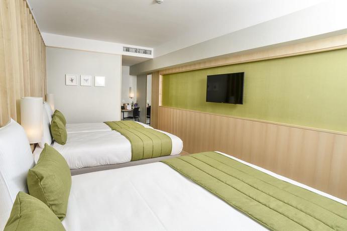 Imagen de la habitación del Hotel Yadoya, Bruselas. Foto 2