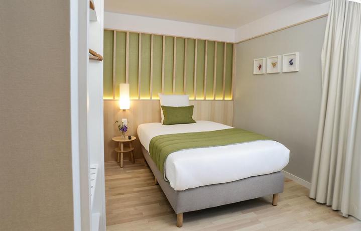 Imagen de la habitación del Hotel Yadoya, Bruselas. Foto 4