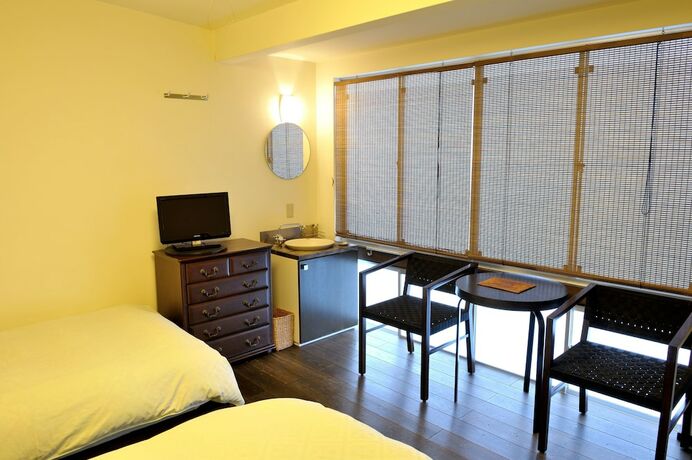 Imagen de la habitación del Hotel Yadoya Nishijinso. Foto 16