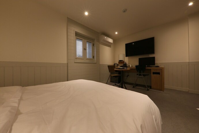 Imagen de la habitación del Hotel Yaja West Gate. Foto 32