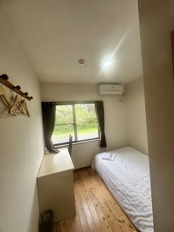 Imagen de la habitación del Hotel Yakushima Guesthouse Suginoko. Foto 8