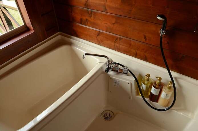 Imagen general del Hotel Yakushima Umi-no Cottage Tida. Foto 15