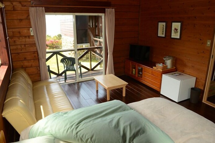 Imagen de la habitación del Hotel Yakushima Umi-no Cottage Tida. Foto 24