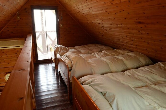 Imagen de la habitación del Hotel Yakushima Umi-no Cottage Tida. Foto 30