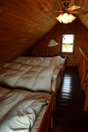 Imagen de la habitación del Hotel Yakushima Umi-no Cottage Tida. Foto 32