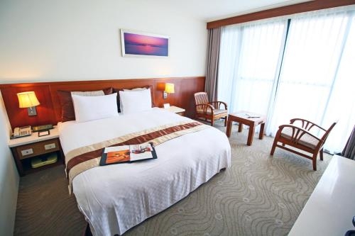 Imagen de la habitación del Hotel Yaling. Foto 6