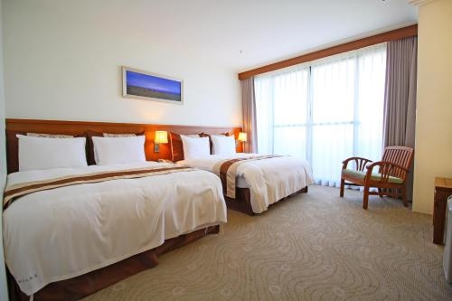 Imagen de la habitación del Hotel Yaling. Foto 7