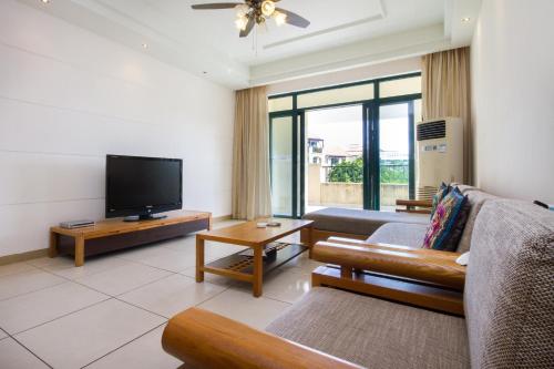 Imagen de la habitación del Hotel Yalong Bay Leju Tropical Coquette Apartment. Foto 8