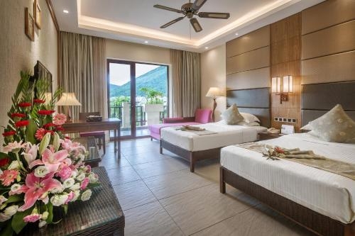 Imagen de la habitación del Hotel Yalong Bay Villas and Spa. Foto 6