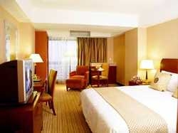 Imagen de la habitación del Hotel Yalong International. Foto 4