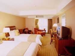 Imagen de la habitación del Hotel Yalong International. Foto 5