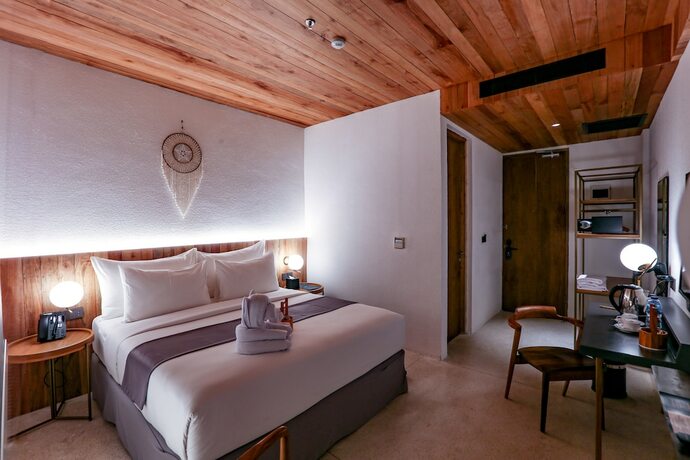 Imagen de la habitación del Hotel Yama Resort. Foto 17