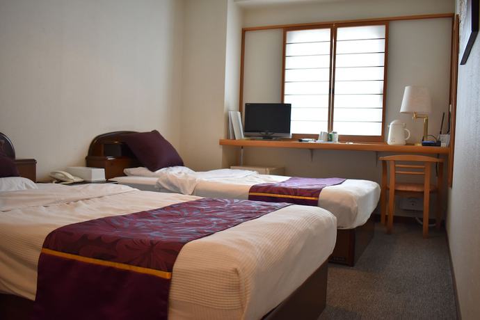 Imagen de la habitación del Hotel Yamachou. Foto 11