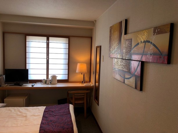 Imagen de la habitación del Hotel Yamachou. Foto 14