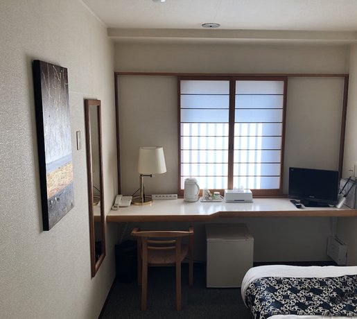 Imagen de la habitación del Hotel Yamachou. Foto 18