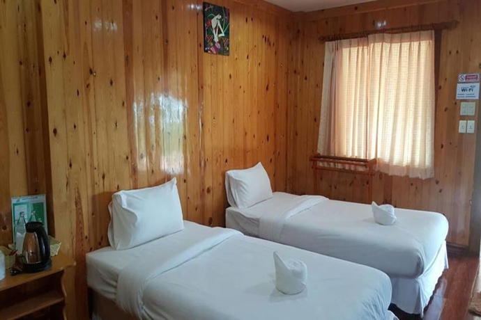 Imagen de la habitación del Hotel Yamadaya Beach Resort. Foto 2