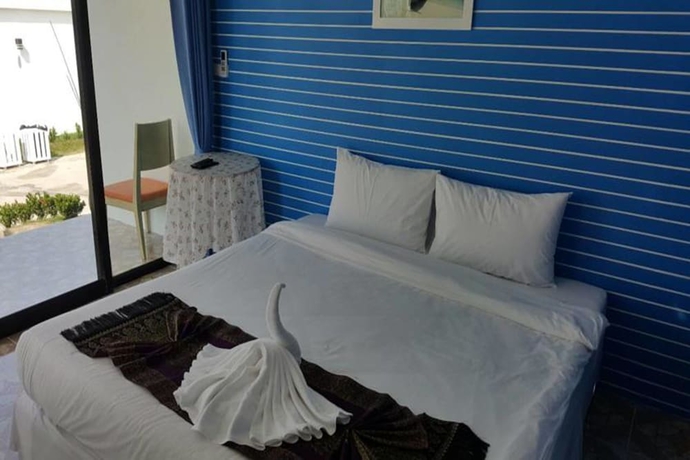 Imagen de la habitación del Hotel Yamadaya Beach Resort. Foto 4