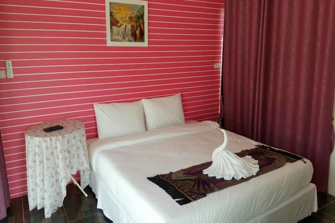 Imagen de la habitación del Hotel Yamadaya Beach Resort. Foto 6