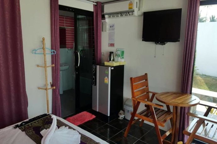 Imagen de la habitación del Hotel Yamadaya Beach Resort. Foto 7