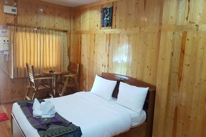 Imagen de la habitación del Hotel Yamadaya Beach Resort. Foto 8
