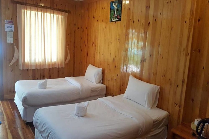 Imagen de la habitación del Hotel Yamadaya Beach Resort. Foto 11