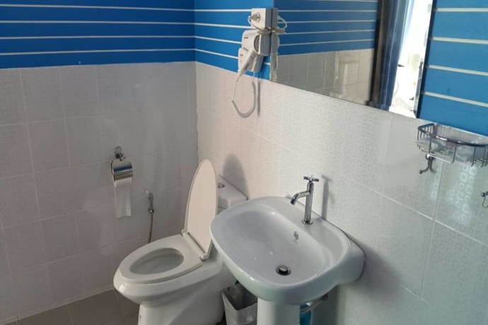 Imagen de la habitación del Hotel Yamadaya Beach Resort. Foto 15