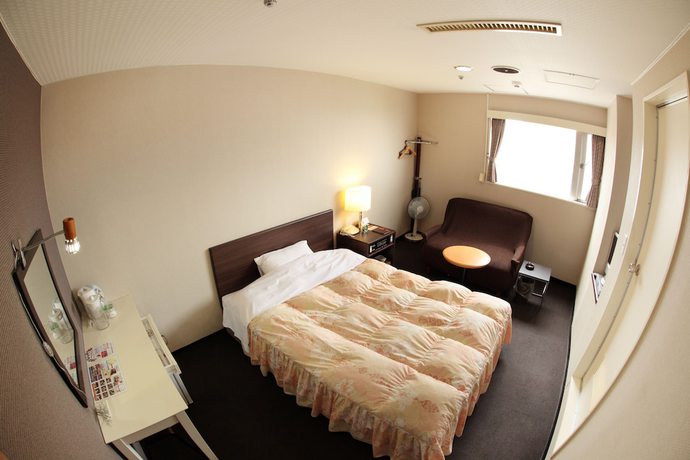 Imagen de la habitación del Hotel Yamanouchi. Foto 14