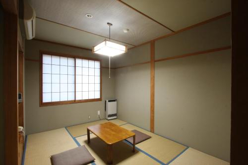 Imagen de la habitación del Hotel Yamasanso. Foto 19