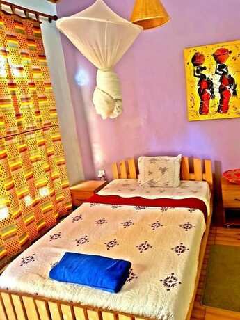 Imagen de la habitación del Hotel Yambi Guesthouse. Foto 20